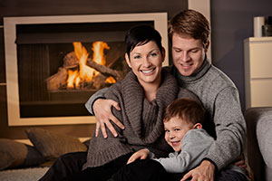 Family by the fireplace